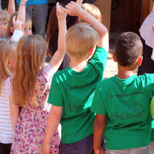 children wearing camp t-shirts